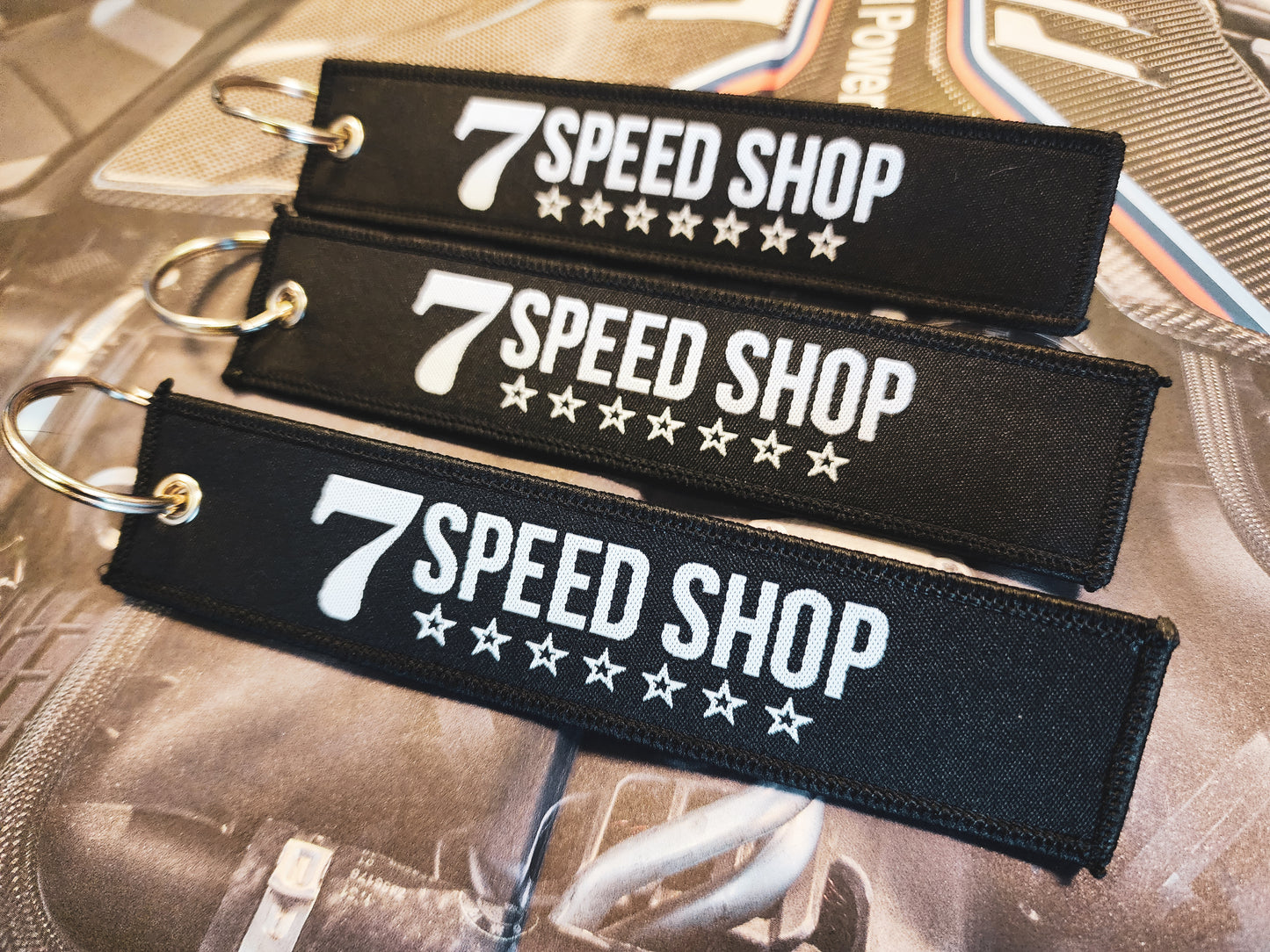 7 speed shop cloth key chain tag
